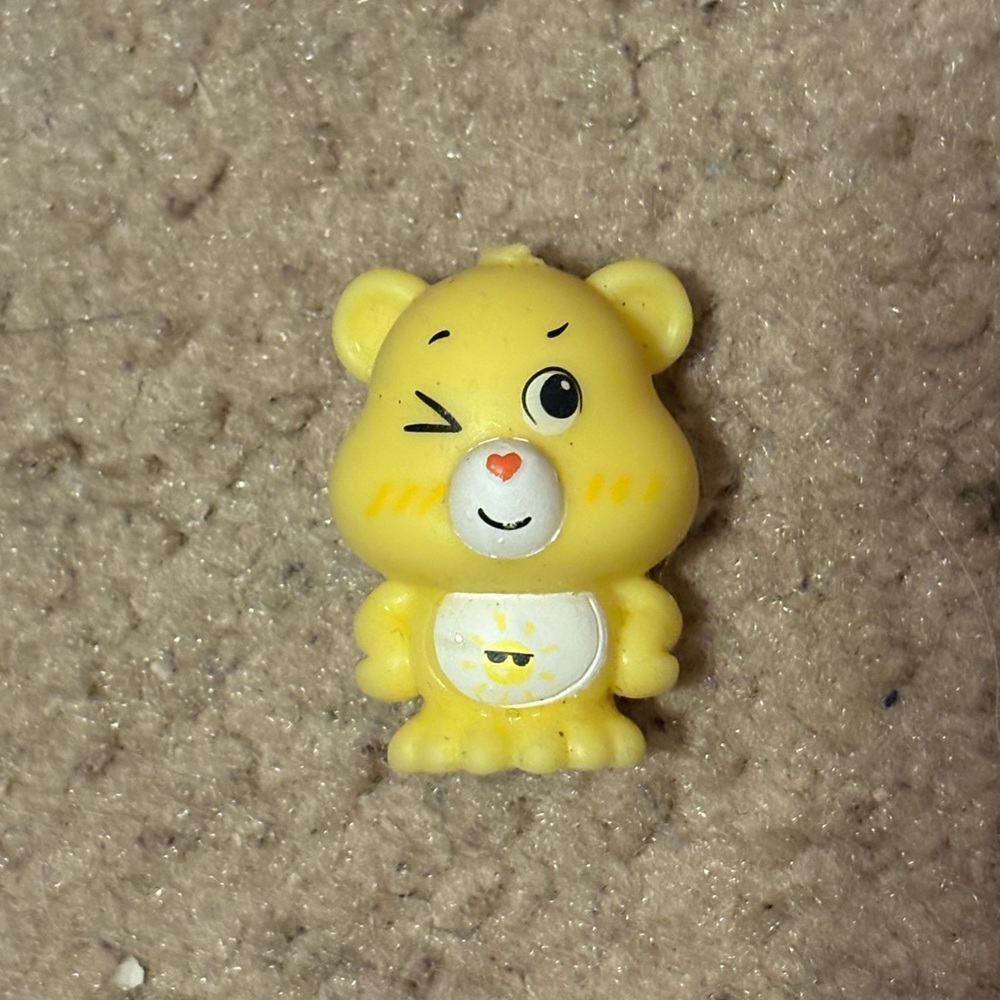 NWOT yellow care bear squishy toy